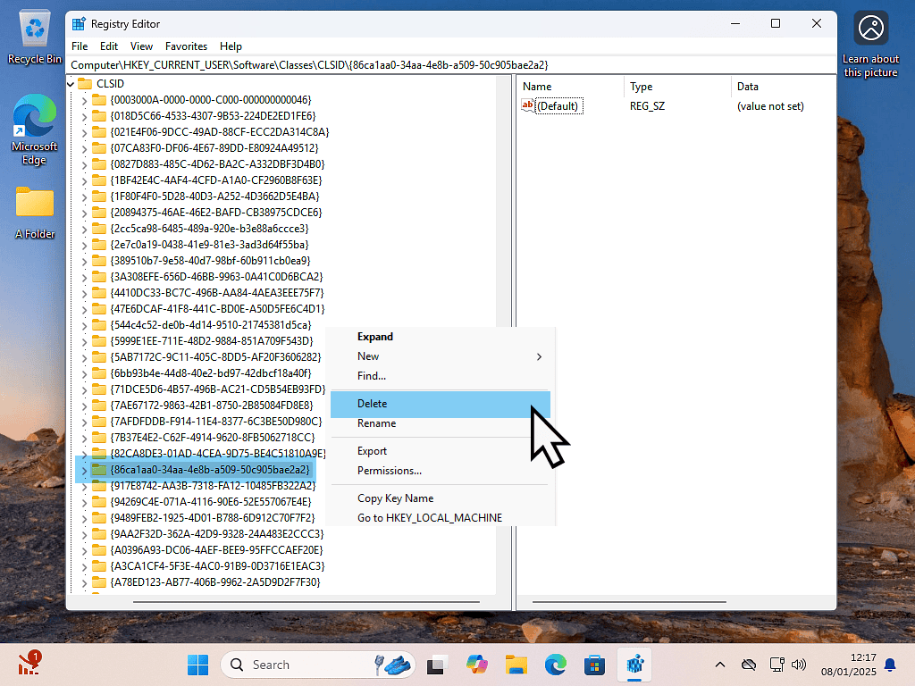 Deleting registry key to return to original context menu in Windows 11.