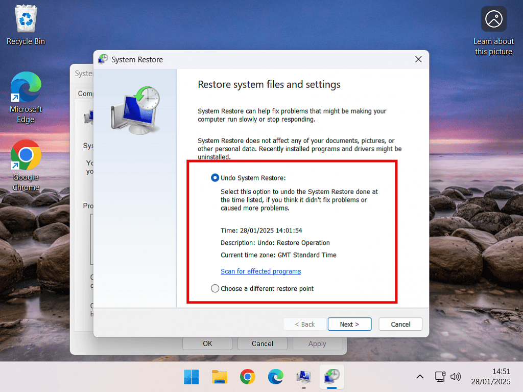 Undo System Restore and Choose a different restore point options.